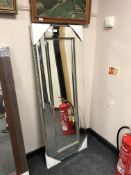 An all glass rectangular mirror