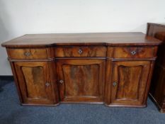 A late nineteenth century mahogany triple door inverted breakfronted sideboard