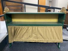 A painted gilt highlighted bookcase