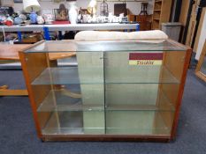 A twentieth century glass shop display cabinet