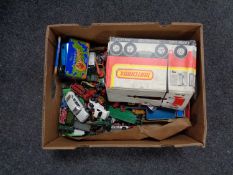 A box of play worn die cast vehicles