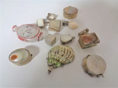 A small box of pill and snuff boxes