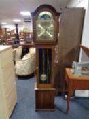 An Fenclocks granddaughter clock with pendulum and weights with brass moonphase dial