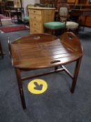 A mahogany butler's tray on stand