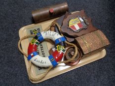A tray of plaques on shields, brass and copper bound table box, copper vessel,