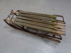 Two vintage wooden sledges