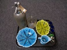 A tray of assorted glassware, soda Syphon, vaseline glass dish, green glass duck paperweight,
