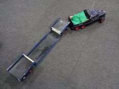 A scratch built remote controlled Pickfords wagon with flat bed trailer