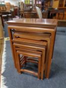 A nest of four oriental hardwood tables