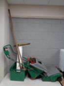 A Qualcast electric lawn mower together with a small quantity of tools