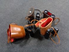 A tray of four sets of cased binoculars to include Prinz and Ross of London