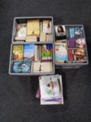 Four crates and a box of paperbacked books,