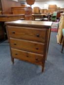 A mid century pine three drawer chest