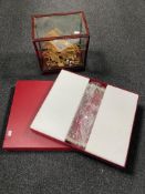 A cork tourist montage in display case together with a boxed silver additions cake plate