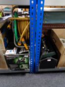 A parkside pressure washer together with a hose on reel,