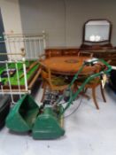 A Qualcast classic petrol 35S self drive lawn mower