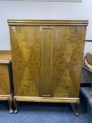 An early twentieth century double door side cabinet