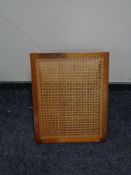 An early 20th century bergere adjustable back rest