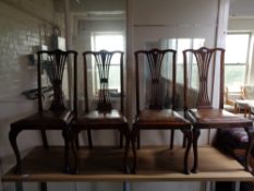 A set of four Edwardian dining chairs