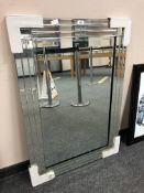 A contemporary all glass mirror,