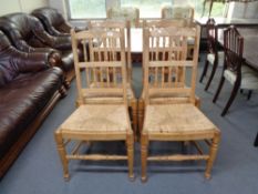 Four country style rail backed kitchen chairs