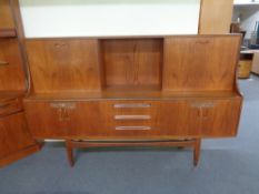 A mid century teak G-plan sideboard CONDITION REPORT: 190 cm x 46 cm x 122 cm.