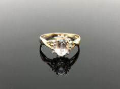 A 10ct gold aquamarine and diamond ring,