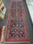 A North-West Persian runner on indigo ground,