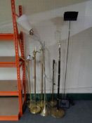 A collection of seven floor lamps - examples in brass,