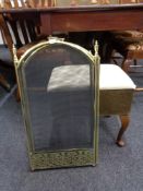 A three way folding brass spark guard together with a mid century sewing box