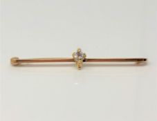A 15ct gold brooch set with 0.25ct diamond, 3.5g.