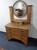 An Edwardian oak Art Nouveau dressing chest