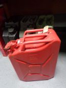 Four metal jerry cans