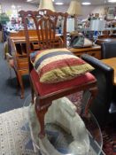 A nineteenth century oak chair together with a cushion