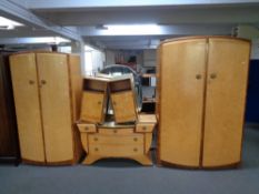 A six piece Birds Eye Maple bedroom suite