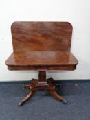 A Victorian mahogany tea table on four way pedestal CONDITION REPORT: Structurally