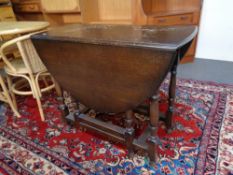 A twentieth century oak gateleg table
