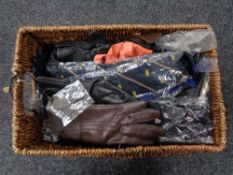 A wicker basket of Gent's gloves and ties,
