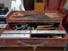 An early twentieth century painted joiner's tool box of tools