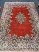 A Saroukh carpet on salmon ground,