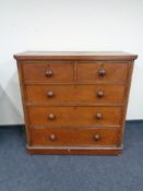 A Victorian mahogany five drawer chest