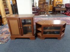 A teak effect corner TV stand and audio cabinet