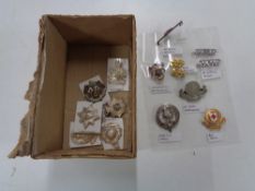 A box of regimental badges