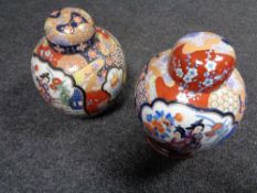 Two Japanese lidded jars depicting Geisha