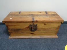 An Eastern pine blanket chest