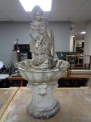 A plastic garden water feature - Mother with children