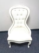 A painted framed lady's chair