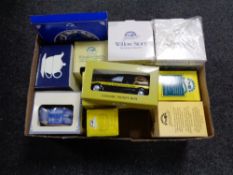 A box of Ringtons china, wall plaques, money boxes, willow storage vase,