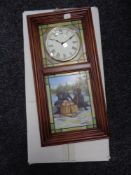 A contemporary wall clock with inter changing panels depicting labradors