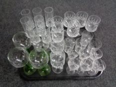 A tray of assorted drinking glasses,